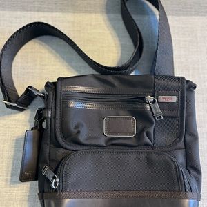 Tumi crossbody bag.